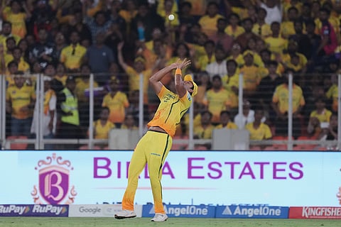 Chennai Super Kings' Shivam Dube takes the catch to dismiss Gujarat Titans' captain Shubman Gill during the Indian Premier League cricket match between Gujarat Titans and Chennai Super Kings in Ahmedabad, India.