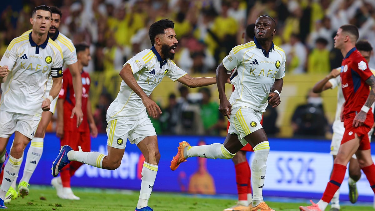 Cristiano Ronaldo, Sadio Mane and other Al-Nassr footballers celebrate after a goal against Damac in Saudi Pro League 2025-26.  - AlNassrFC_EN/X