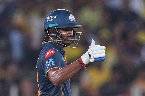 Gujarat Titans' Sai Sudharsan celebrates his fifty runs during the Indian Premier League cricket match between Gujarat Titans and Chennai Super Kings in Ahmedabad, India.