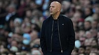 AP Photo : Liverpool's manager Arne Slot reacts during the English Premier League soccer match between Aston Villa and Liverpool in Birmingham.