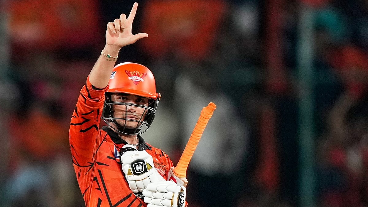 Sunrisers Hyderabad's Abhishek Sharma celebrates his fifty runs during the Indian Premier League cricket match between Sunrisers Hyderabad and Royal Challengers Bengaluru in Hyderabad, India, Friday, May 22, 2026 - (AP Photo/Mahesh Kumar A.)