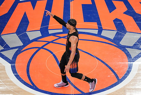 New York Knicks guard Josh Hart (3) reacts after scoring a three-point goal during the second half of Game 2 in the Eastern Conference finals NBA basketball playoffs series against the Cleveland Cavaliers, in New York.