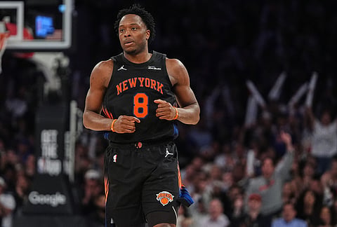 New York Knicks' Og Anunoby reacts after making a three-point shot during the second half of Game 2 in the Eastern Conference finals NBA basketball playoffs series against the Cleveland Cavaliers, in New York.