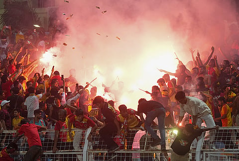 East Bengal supporters celebrate with firecrackers after their team’s victory in the Indian Super League (ISL) 2026 football match against Inter Kashi, in Kolkata.

