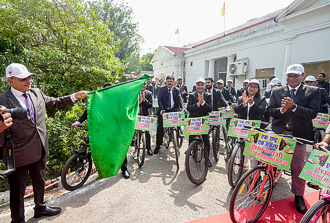 Administrative Judge of the Allahabad High Court, Lucknow Bench, Justice Rajesh Singh Chauhan flags off the bicycle rally led by Lucknow District and Sessions Judge Malkhan Singh, to raise awareness about fuel conservation in view of Prime Minister Narendra Modi's appeal, in Lucknow, Uttar Pradesh.