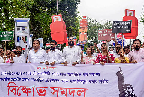 All Assam Students' Union (AASU) members take out a statewide protest rally against the surging prices of essential commodities and fuel, in Guwahati.