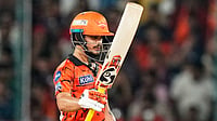 AP/Mahesh Kumar A. : Ishan Kishan celebrates his fifty runs during the Indian Premier League match between SunRisers Hyderabad and Royal Challengers Bengaluru in Hyderabad.