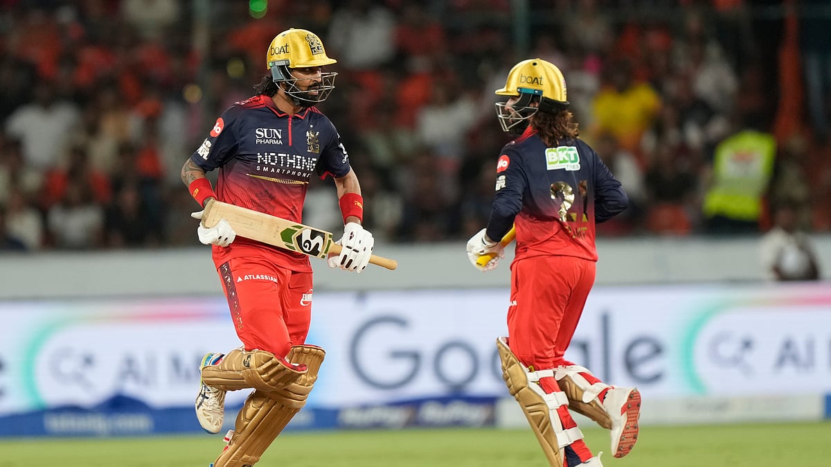 Royal Challengers Bengaluru's Krunal Pandya and Royal Challengers Bengaluru's captain Rajat Patidar run between the wickets to score during the Indian Premier League cricket match between Sunrisers Hyderabad and Royal Challengers Bengaluru in Hyderabad. - AP Photo