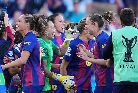Barcelona's Alexia Putellas, from left, Ewa Pajor, goalkeeper Catalina Coll, Clara Serrajordi and Caroline Graham Hansen celebrate at the end of the Women's Champions League final soccer match between FC Barcelona and OL Lyonnes, in Oslo.