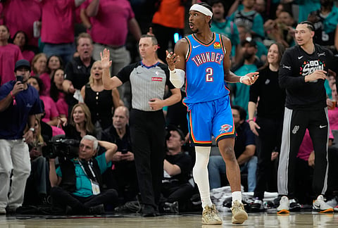 Oklahoma City Thunder guard Shai Gilgeous-Alexander (2) reacts during the second half of Game 3 in the Western Conference finals NBA basketball playoffs series against the San Antonio Spurs in San Antonio. 