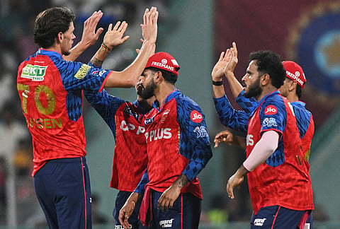 Punjab Kings' Marco Jansen, left, celebrates with teammates the wicket of Lucknow Super Giants' Mukul Choudhary during the Indian Premier League cricket match between Lucknow Super Giants and Punjab Kings, in Lucknow.
