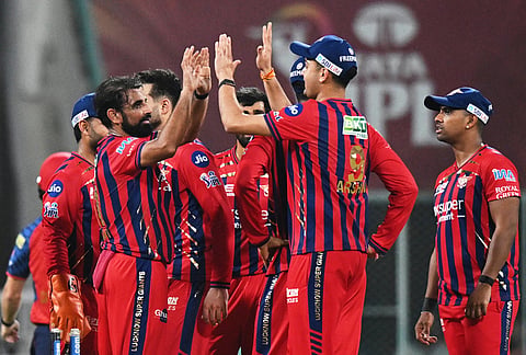 Lucknow Super Giants' Mohammed Shami, left, celebrates with teammates the wicket of Punjab Kings' Cooper Connolly during the Indian Premier League cricket match between Lucknow Super Giants and Punjab Kings, in Lucknow.