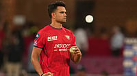 | Photo: AP/Manish Swarup : Lucknow Super Giants' Arjun Tendulkar warms up before the start of the Indian Premier League cricket match between Lucknow Super Giants and Delhi Capitals in Lucknow, India.