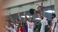 | Photo: PTI/Swapan Mahapatra : East Bengal players celebrate with the trophy after their team's victory in the Indian Super League (ISL) 2026 football match against Inter Kashi, in Kolkata.