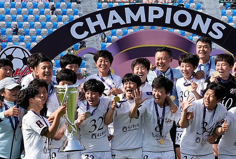 Naegohyang Women's FC's players celebrate on the podium after winning the AFC Women's Champions League soccer final match against Tokyo Verdy Beleza in Suwon, South Korea.