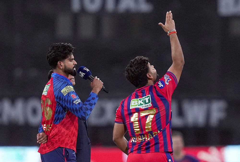 Lucknow Super Giants' captain Rishabh Pant flips the coin as Punjab Kings' captain Shreyas Iyer takes the call during the toss before an Indian Premier League (IPL) 2026 T20 cricket match between Lucknow Super Giants and Punjab Kings, in Lucknow, Uttar Pradesh. - | Photo: PTI/Atul Yadav