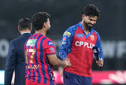 Lucknow Super Giants' captain Rishabh Pant, left, and Punjab Kings' captain Shreyas Iyer during the toss before an Indian Premier League (IPL) 2026 T20 cricket match between Lucknow Super Giants and Punjab Kings, in Lucknow, Uttar Pradesh.