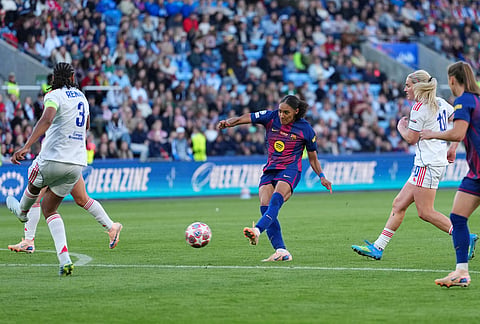 Barcelona's Salma Paralluelo scores her side's third goal during the Women's Champions League final soccer match between FC Barcelona and OL Lyonnes, in Oslo.