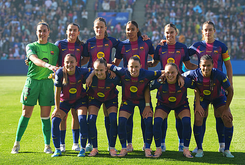 Barcelona players pose before the Women's Champions League final soccer match between FC Barcelona and OL Lyonnes, in Oslo.