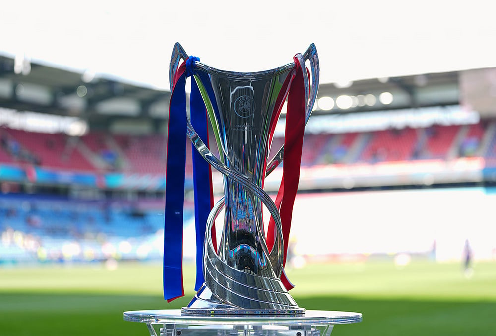 The tournament trophy is displayed on the pitch ahead of the Women's Champions League final soccer match between FC Barcelona and OL Lyonnes, in Oslo. - | Photo: AP/Kirsty Wigglesworth