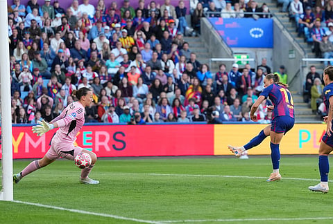 Barcelona's Ewa Pajor scores her side's second goal during the Women's Champions League final soccer match between FC Barcelona and OL Lyonnes, in Oslo.
