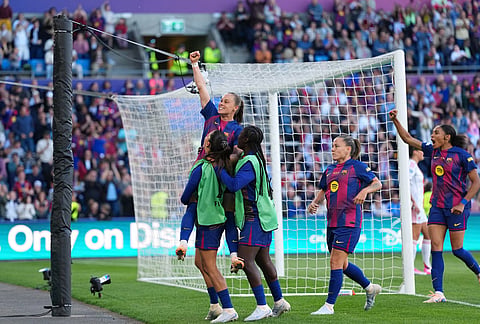 Barcelona's Ewa Pajor celebrates after scoring her side's second goal during the Women's Champions League final soccer match between FC Barcelona and OL Lyonnes, in Oslo.