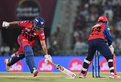 Lucknow Super Giants' captain Rishabh Pant completes a run during the Indian Premier League cricket match between Lucknow Super Giants and Punjab Kings, in Lucknow.