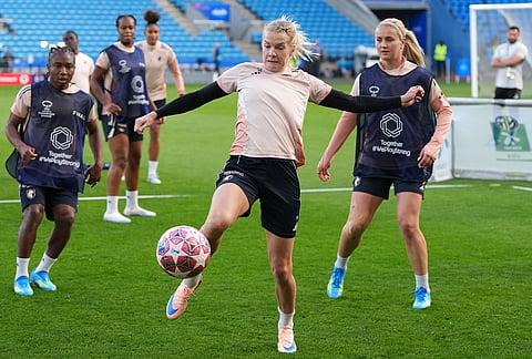 Lyonnes' Ada Hegerberg reaches for the ball during a training session on the eve of the Women's Champions League final soccer match between FC Barcelona and OL Lyonnes, in Oslo.