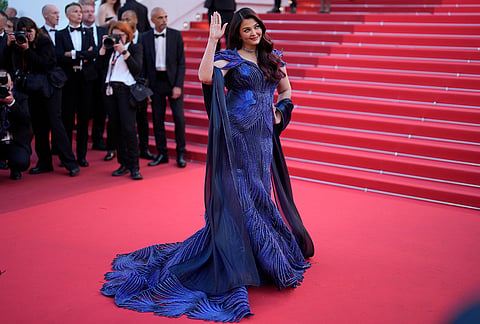 Aishwarya Rai Bachchan poses for photographers upon arrival at the premiere of the film 'The Birthday Party' at the 79th international film festival, Cannes, southern France.