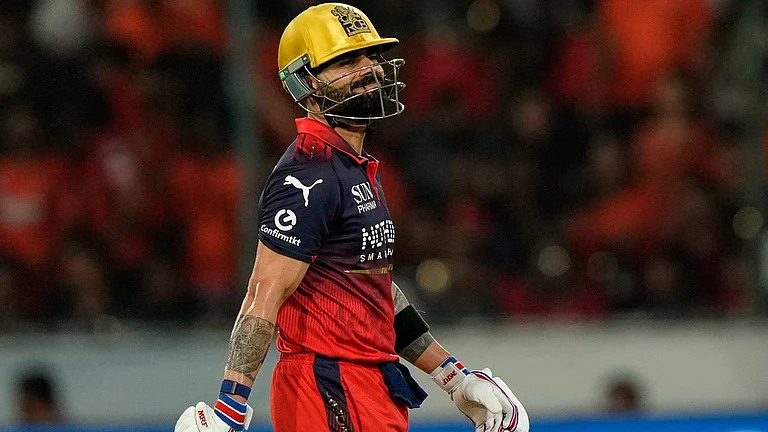 Royal Challengers Bengaluru's Virat Kohli leaves the ground after losing his wicket during the Indian Premier League cricket match between Sunrisers Hyderabad and Royal Challengers Bengaluru in Hyderabad, India, Friday, May 22, 2026. - AP Photo/Mahesh Kumar A.