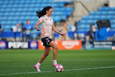 Lyonnes' Ingrid Engen runs with a ball during a training session on the eve of the Women's Champions League final soccer match between FC Barcelona and OL Lyonnes, in Oslo.