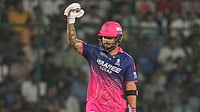 | Photo: AP/Manish Swarup : Rajasthan Royals' captain Riyan Parag celebrates his fifty runs during the Indian Premier League cricket match between Delhi Capitals and Rajasthan Royals in New Delhi, India.
