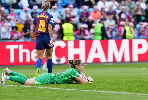 Barcelona goalkeeper Catalina Coll holds on to the ball during the Women's Champions League final soccer match between FC Barcelona and OL Lyonnes, in Oslo.