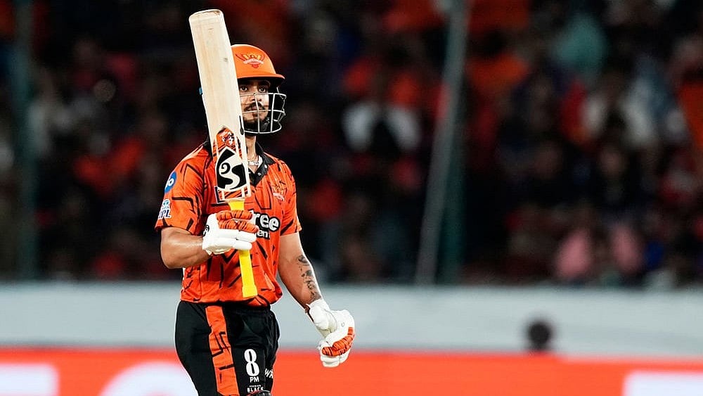 Sunrisers Hyderabad's captain Ishan Kishan celebrates his fifty runs during the Indian Premier League cricket match between Sunrisers Hyderabad and Royal Challengers Bengaluru in Hyderabad, India. - | Photo: AP/Mahesh Kumar A.