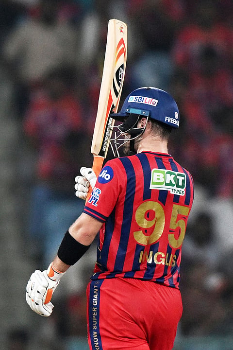 Lucknow Super Giants' Josh Inglis celebrates his fifty runs during the Indian Premier League cricket match between Lucknow Super Giants and Punjab Kings, in Lucknow.
