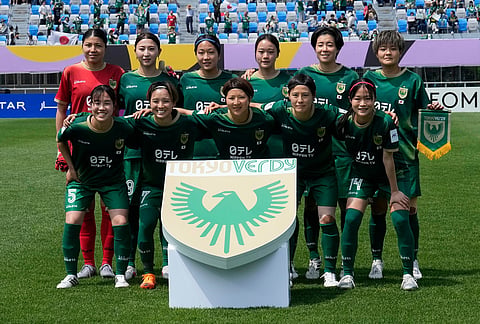 Tokyo Verdy Beleza's players pose for a team photo before the start of the AFC Women's Champions League soccer final match against Naegohyang Women's FC in Suwon, South Korea.