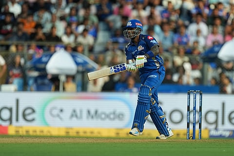 Mumbai Indians' Suryakumar Yadav plays a shot during the Indian Premier League cricket match between Mumbai Indians and Rajasthan Royals in Mumbai, India.
