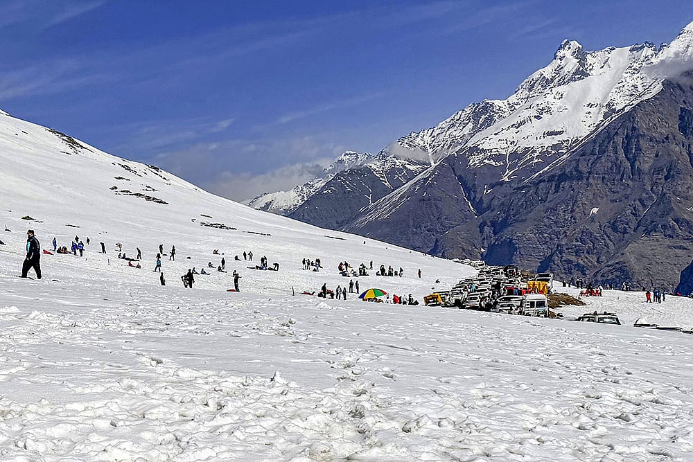 People gather near Rohtang Pass