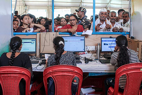 People queue up for offline registration for the Char Dham Yatra 2026, in Haridwar, Uttarakhand.