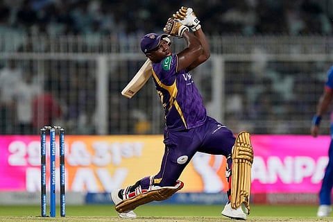 Kolkata Knight Riders' Rovman Powell plays a shot during the Indian Premier League cricket match between Delhi Capitals and Kolkata Knight Riders, in Kolkata, India,