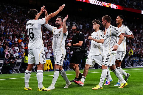 Realk Madrid players celebrate after scoring during a La Liga soccer match between Real Madrid and Athletic in Madrid, Spain.