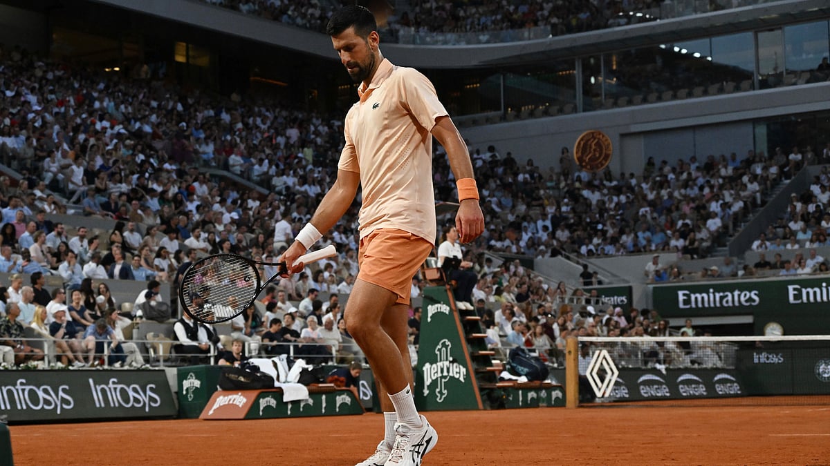 Novak Djokovic of Serbia walks as he plays against Giovanni Mpetshi Perricard of France during their first round men's singles tennis match at the French Open tennis tournament in Paris, Sunday, May 24, 2026 - (AP Photo/Emma Da Silva)