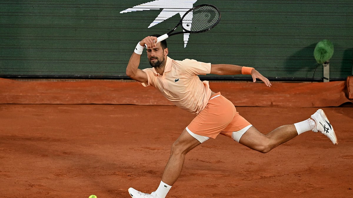 Novak Djokovic of Serbia returns to Giovanni Mpetshi Perricard of France during their first round men's singles tennis match at the French Open tennis tournament in Paris, Sunday, May 24, 2026 - (AP Photo/Emma Da Silva)