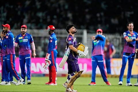 Kolkata Knight Riders' Rinku Singh leaves the ground after losing his wicket during the Indian Premier League cricket match between Delhi Capitals and Kolkata Knight Riders, in Kolkata, India.