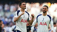 Photo: AP/Frank Augstein : Tottenham's Joao Palhinha, left, and Rodrigo Bentancur celebrate after beating Everton during the English Premier League match in London, England.