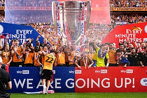 | Photo; Jordan Pettitt/PA via AP : Hull City players celebrate winning promotion to the Premier League following the Championship play-off final between Hull City and Middlesbrough at Wembley Stadium, London.