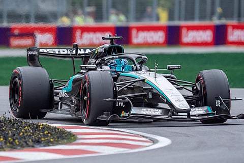 Mercedes driver George Russell, of Britain, celebrates after taking the position during qualifying at the F1 Canadian Grand Prix auto race in Montreal.