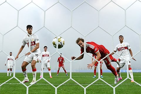 Bayern's Harry Kane scores his first goal during the DFB Pokal, German Cup final soccer match between VfB Stuttgart and Bayern Munich in Berlin, Germany.