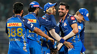 AP Photo : Mumbai Indians' Deepak Chahar, centre, celebrates with teammates the wicket of Kolkata Knight Riders' Finn Allen during the Indian Premier League cricket match between Kolkata Knight Riders and Mumbai Indian.
