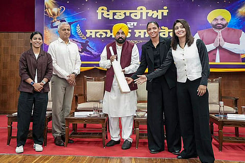 In this image posted on May 24, 2026, Punjab Chief Minister Bhagwant Mann with cricketer Harmanpreet Kaur, and others, during the Maharaja Ranjit Singh Award, DBT and cash award distribution ceremony, in Chandigarh, Punjab.